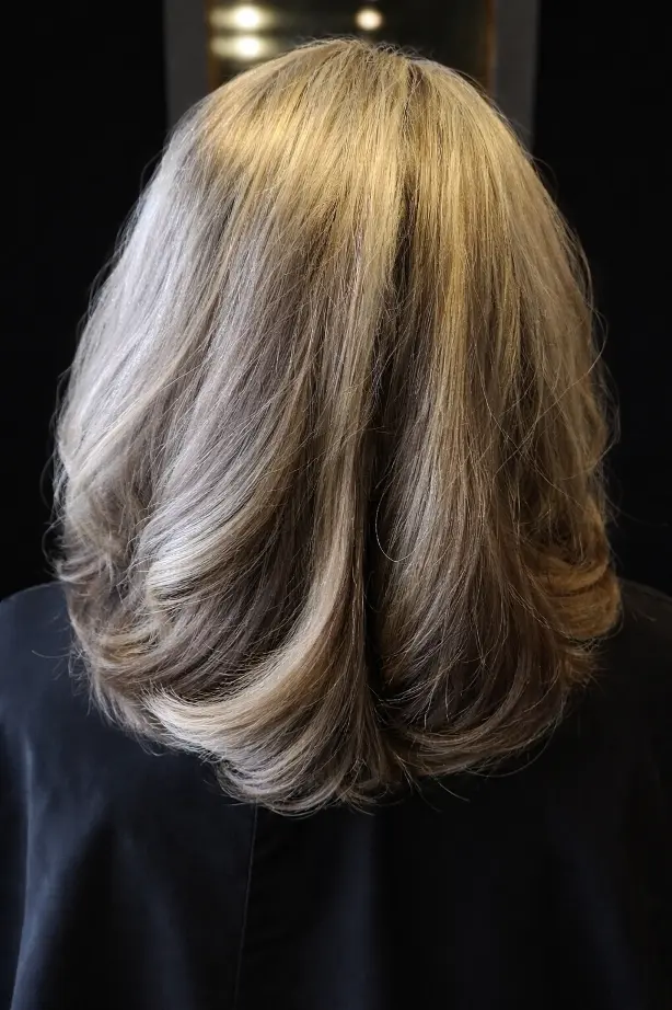 Resultaat van highlights en lowlights door Bianca van Kapsalon Bicare in Leek